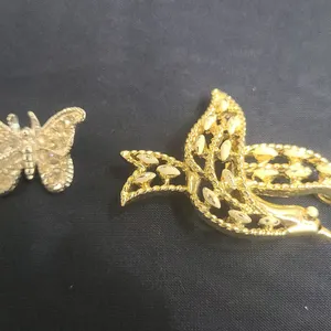 Two Costume Jewelry Pins: Rhinestone Butterfly Brooch and Signed Gold-Tone Bird Brooch with Openwork