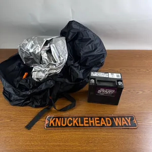 KNUCKLEHEAD WAY METAL SIGN & BIKE COVER WITH DYNA BATTERY THAT SHOULD COME BACK TO LIFE