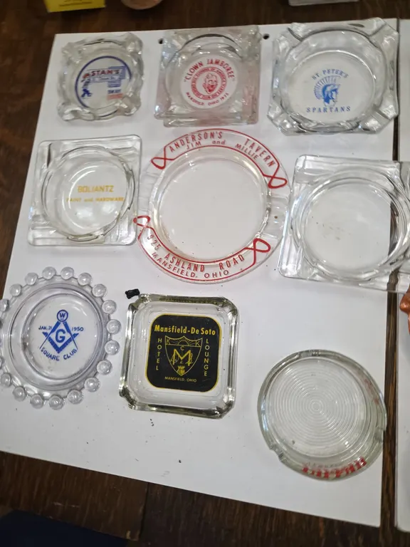 Glass ashtrays including saint pete's anderson, cavern beau, lance hardware Mansfield Hotel Stans