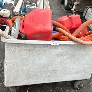 ROLLING BIN WITH ASSORTED CONTENTS INCLUDING; FUEL CANS VACUUM HOSES, FLOOR BURNISHER PAD & MORE