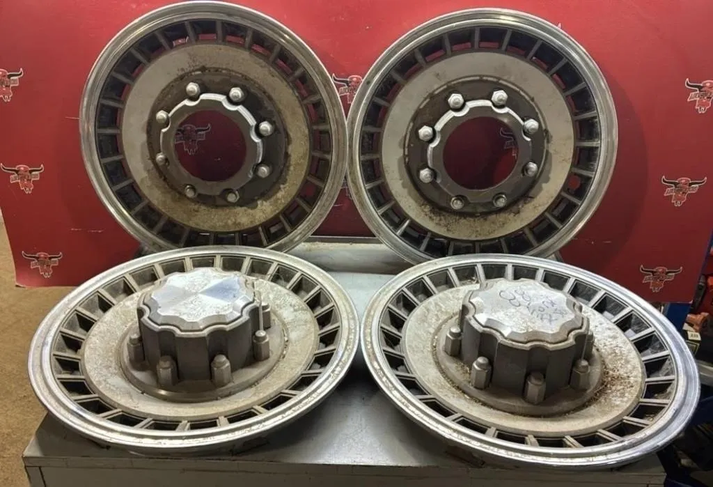 Four 1988 Ford Wheel Covers.