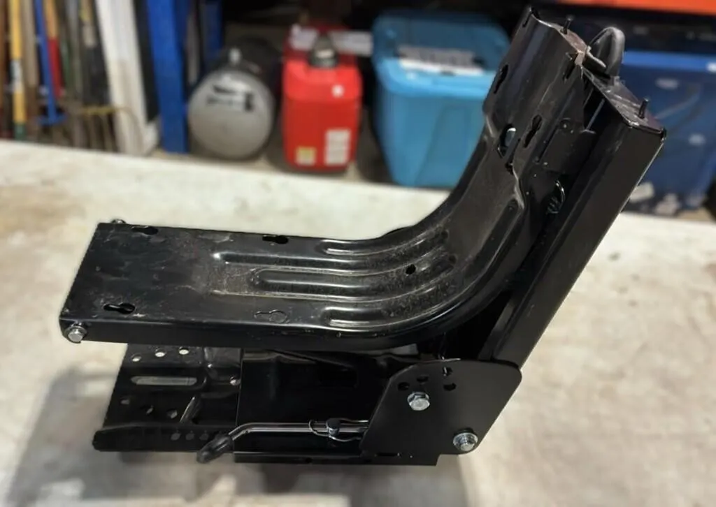 Unused Mower Seat Mount.