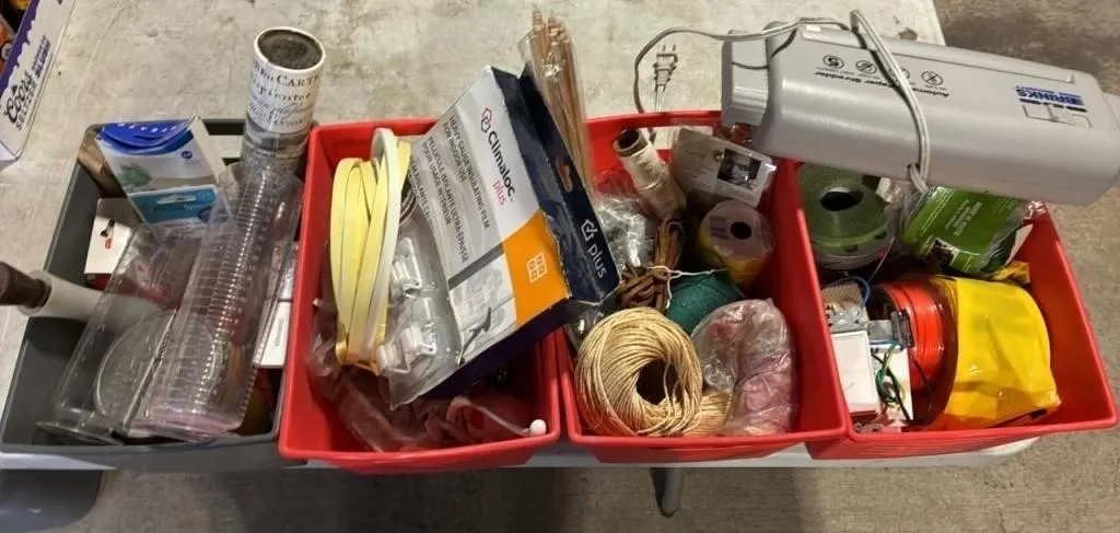 4 Little Tubs of Household Items.
