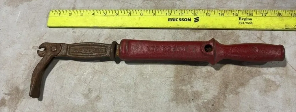 Old Cast Iron Nail Puller.