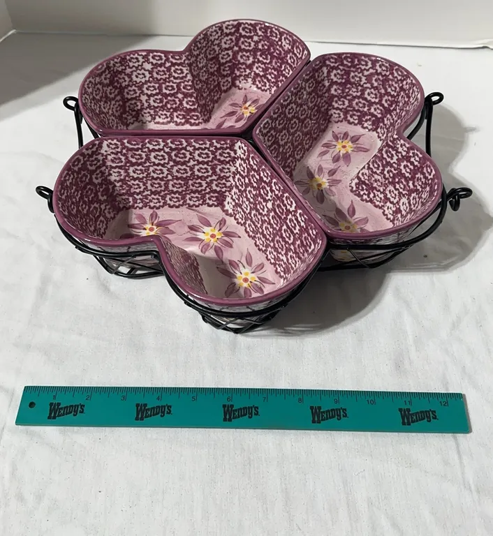 Temp-tations Old World Cranberry floral heart-shaped server with a wrought iron wire rack.