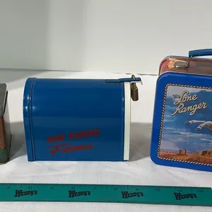 Lot of 3 tins. Two are Bob Evans banks and one is a Lone Ranger miniature lunchbox