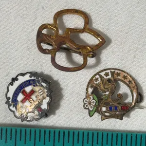 Three vintage pins