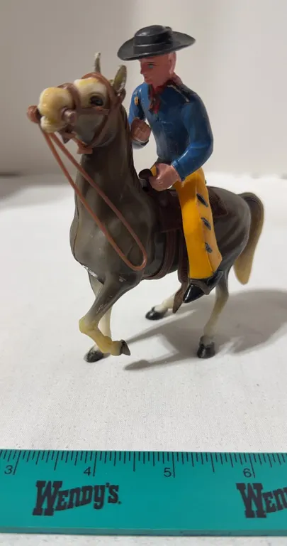 Vintage 1950s hard plastic toy cowboy and horse set