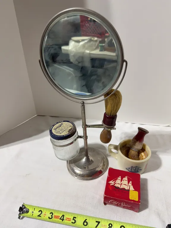 Antique pedestal shaving mirror and stand with other shaving supplies