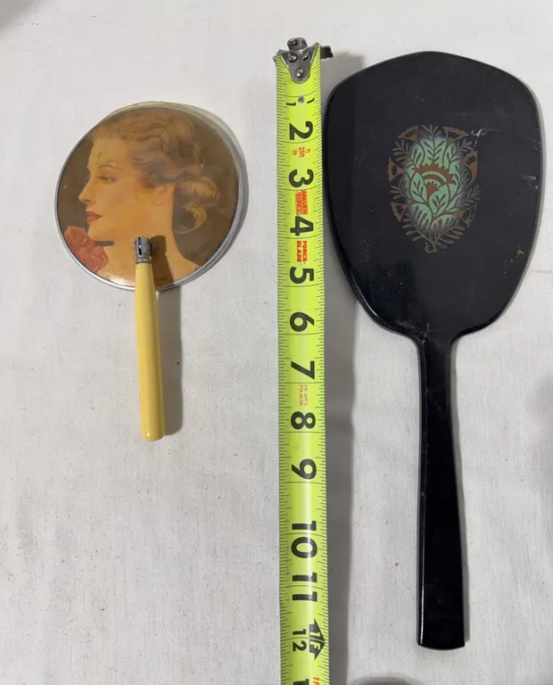 Pair of vintage handheld mirrors