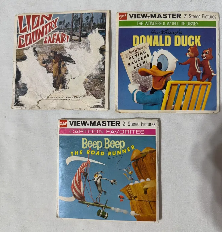 Three vintage GAF View-Master 21-stereo-picture reel packets