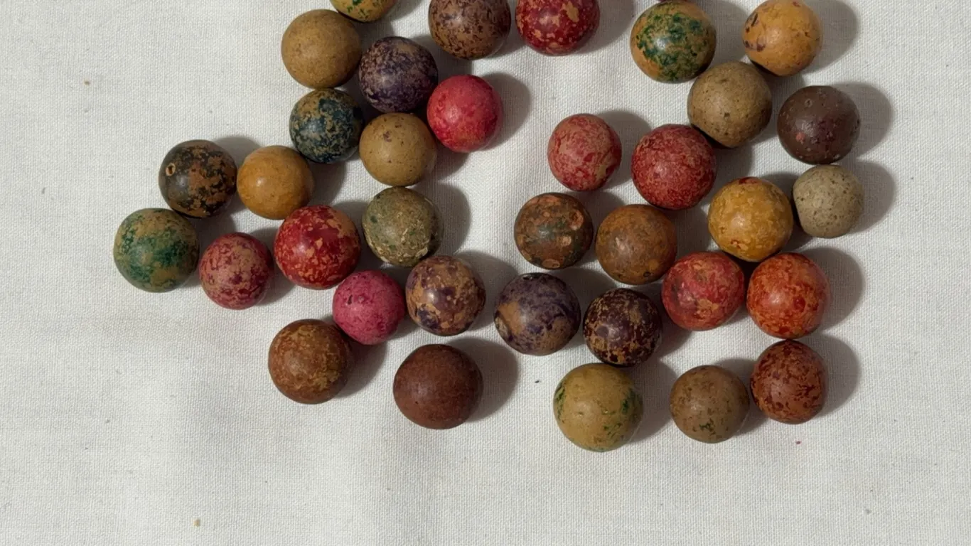 Over 35 antique clay marbles
