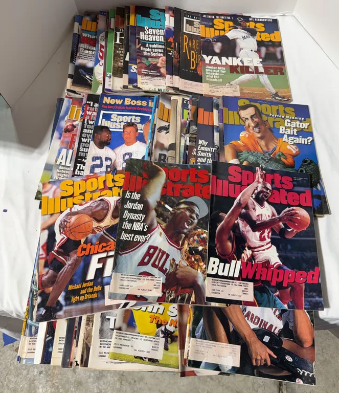 Over 50 sports illustrated. Three Michael Jordan covers.