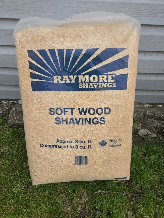 Cube of wood shavings