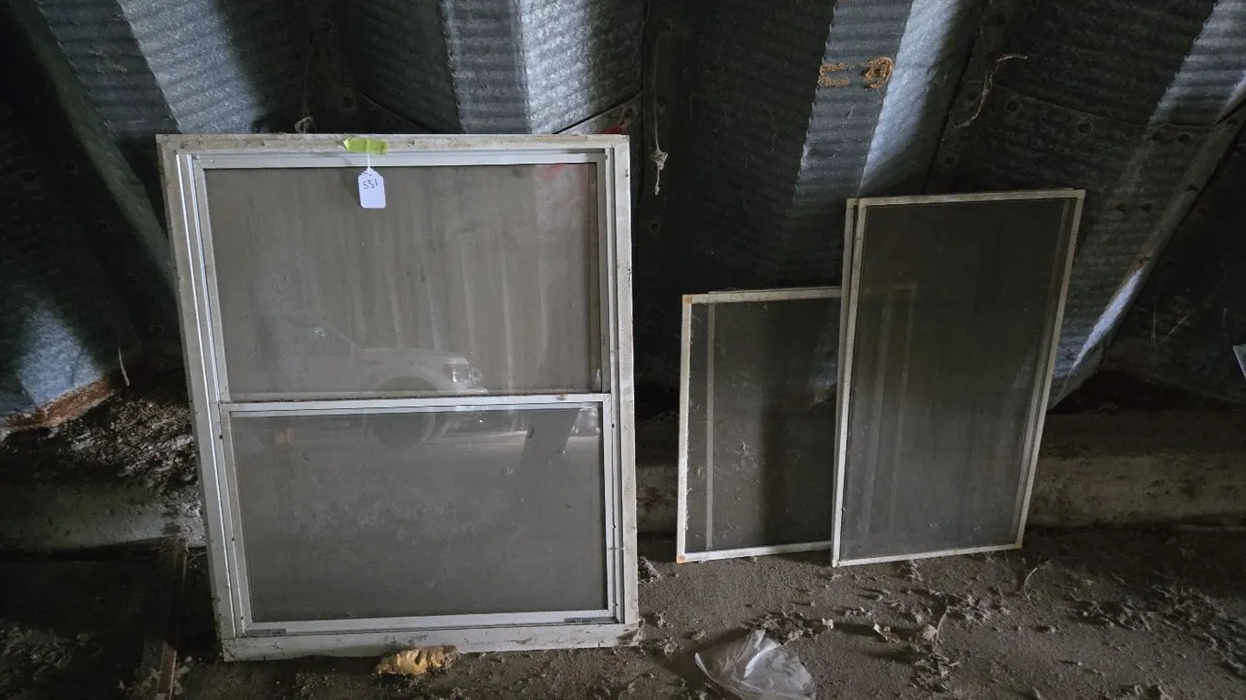 Aluminum framed windows w/screens (2) , plus extra screens (4)