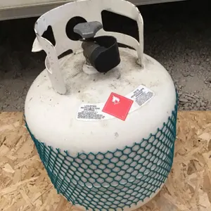 Propane tank, appears almost full, certification unknown