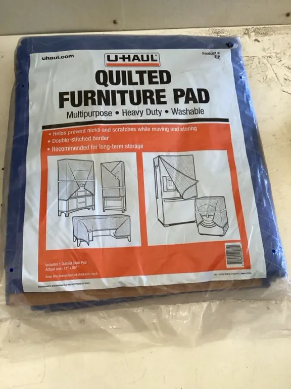 Quilted furniture pad, multipurpose, heavy duty, has a small tear, new, 72” x 80”