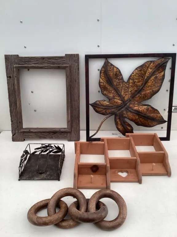 Decorative items, metal leaf in frame, approximately 19 1/2“ x 19 1/2“, wooden shelf, frame, etc.