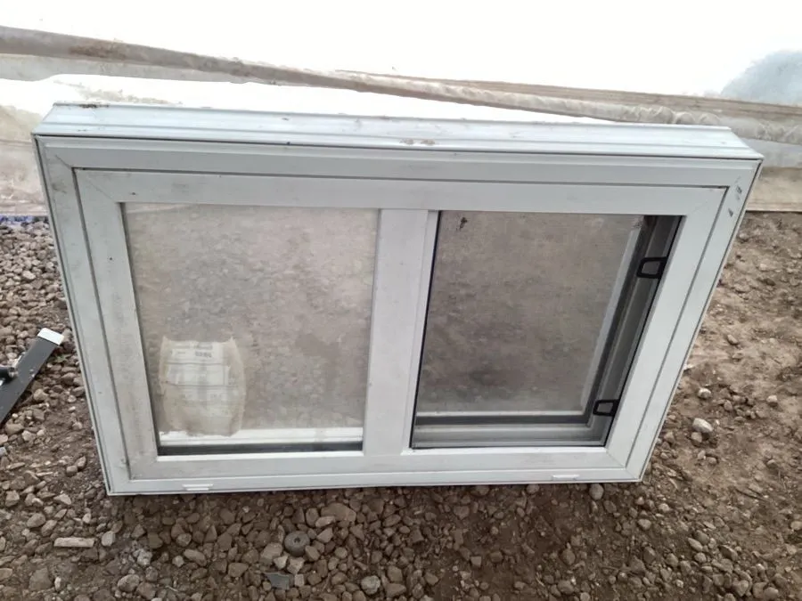 Dual pane slider window, 28 1/2“ x 19 1/4” x 3 1/2"