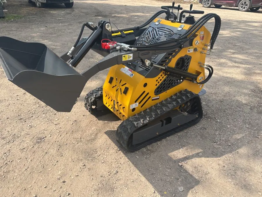 SDLANCH SSL 60 skid steer loader. Stand on platform. Gas engine.