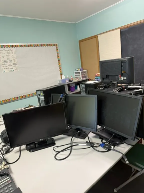 Computer Monitors (2 Dell, 1 LG), 3 keyboards, 4 mouses with cords, speakers