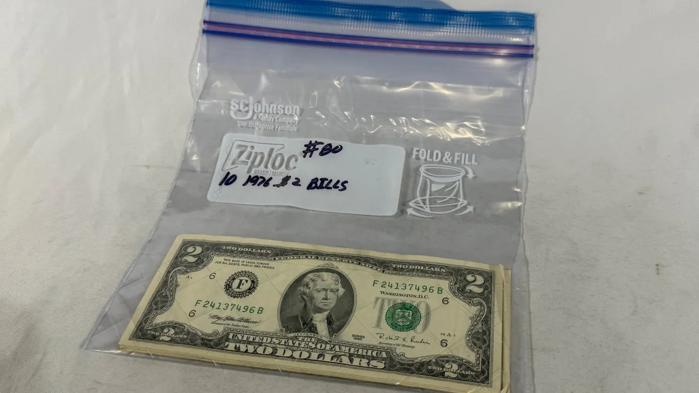 (10) TWO DOLLAR BILLS
