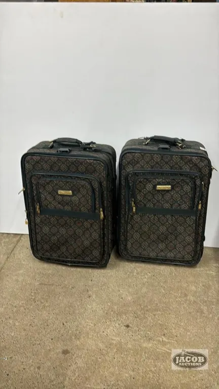 (2) MATCHING OSCAR DE LA RENTA SUITCASES