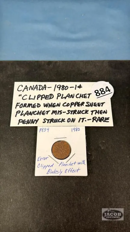 CAN. 1980 ERROR CLIPPED PLANCHET 1CENT COIN