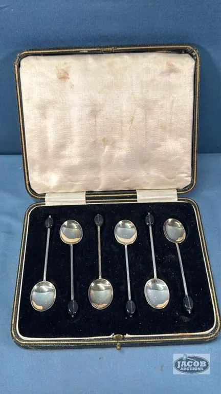 SET OF STERLING SILVER SPOONS