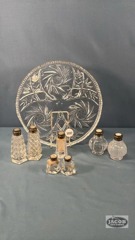(3) SETS OF SALT AND PEPPERS ON A 10IN GLASS PLATE