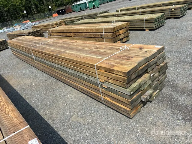 Quantity of (36) 3 in x 10 in x 24 ft Surplus Pressure Treated Lumber