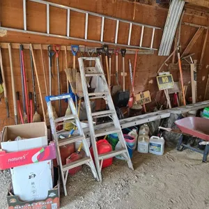 Assorted Yard Tools, Ladders and Wheelbarrow
 UNRESERVED