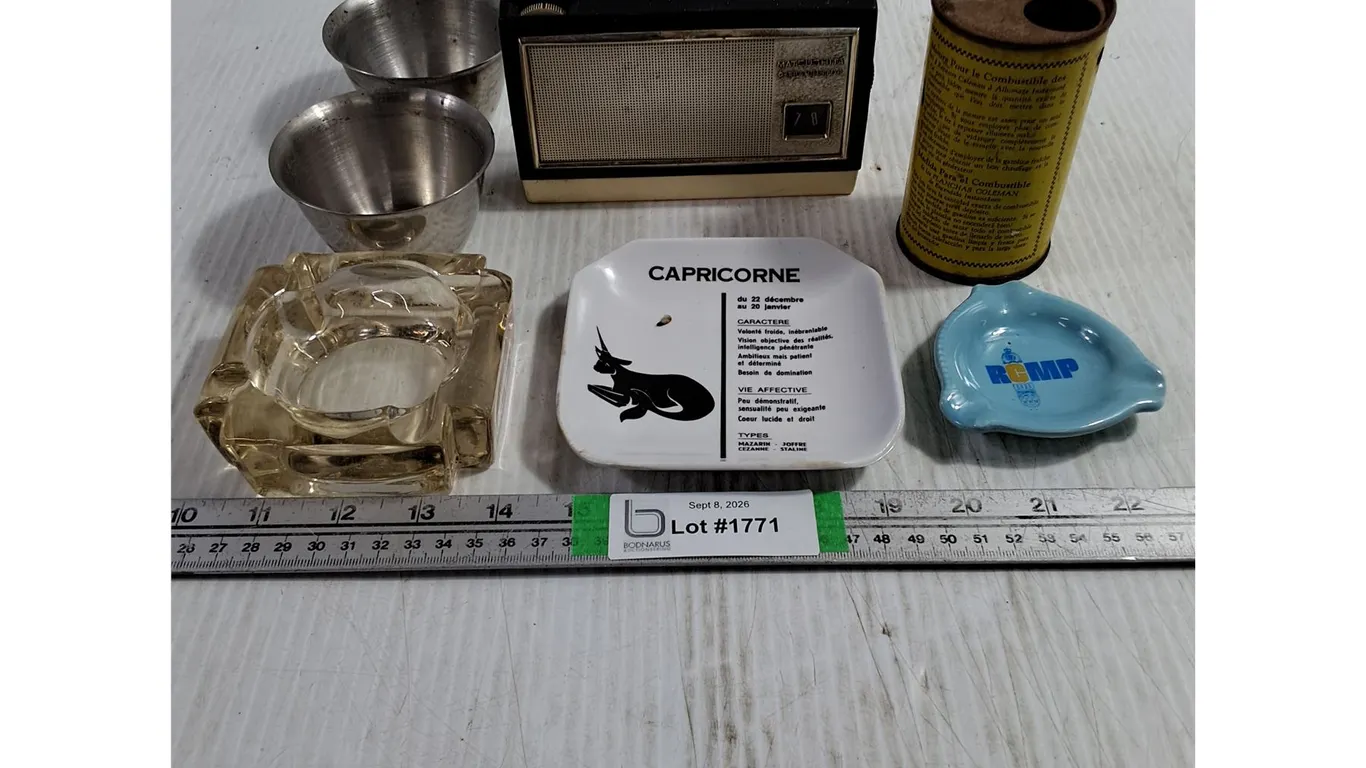 (3) Ashtrays,Coleman Measuring Tin,Transistor Radio,(2) Stainless Steel Cups