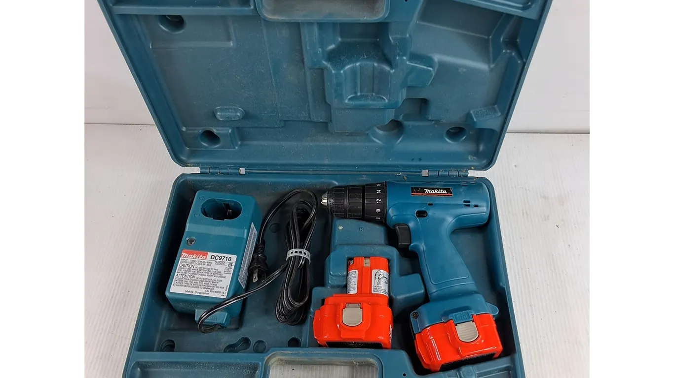 Makita Cordless Drill w/ (2) Batteries & Battery Charger - Powers On, As Is