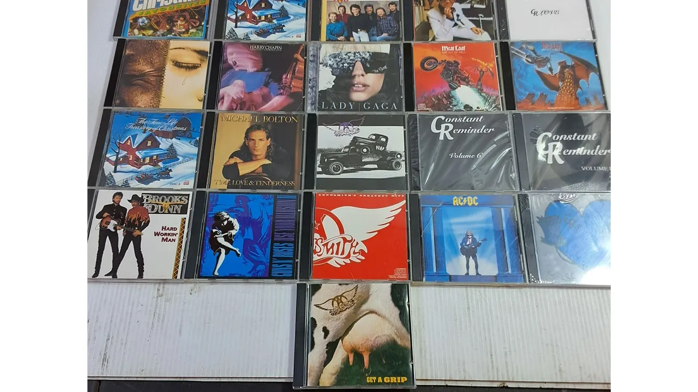 (21) Assorted CD Discs - AC/DC, Guns & Roses, Aerosmith