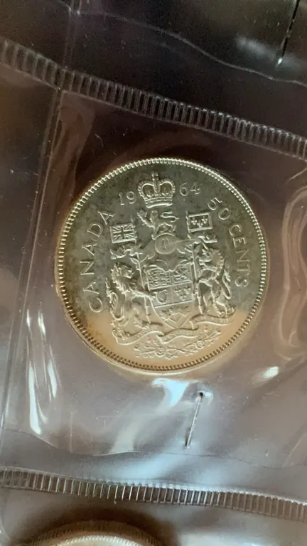 1963 Canada 50 Cents Silver Coin, British Arms Reverse