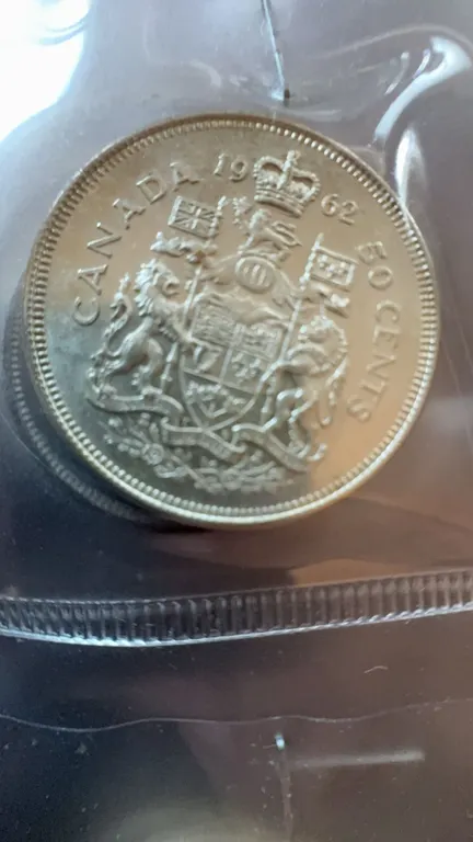 1962 Canada 50 Cents Silver Coin, 80% Silver, British Arms Reverse
