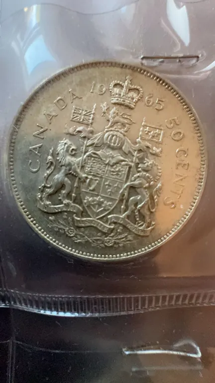 1965 Canada 50 Cents 80% Silver Coin With British Arms Design