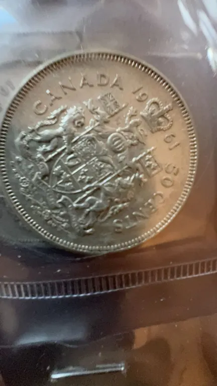 Canada 1961 50 Cents Silver Coin with British Arms Design