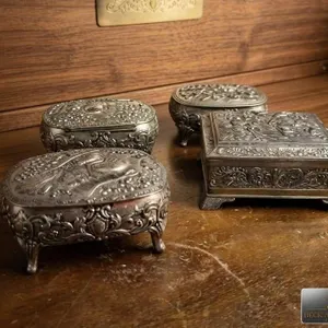 Four Ornate Silver Jewellery Boxes with Red Linings