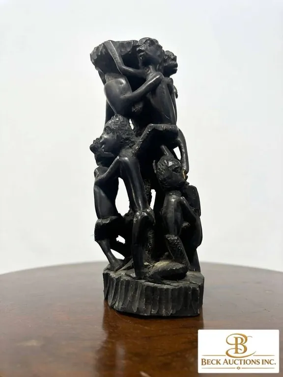 Hand-Carved Ebony African Sculpture of Six Figures
