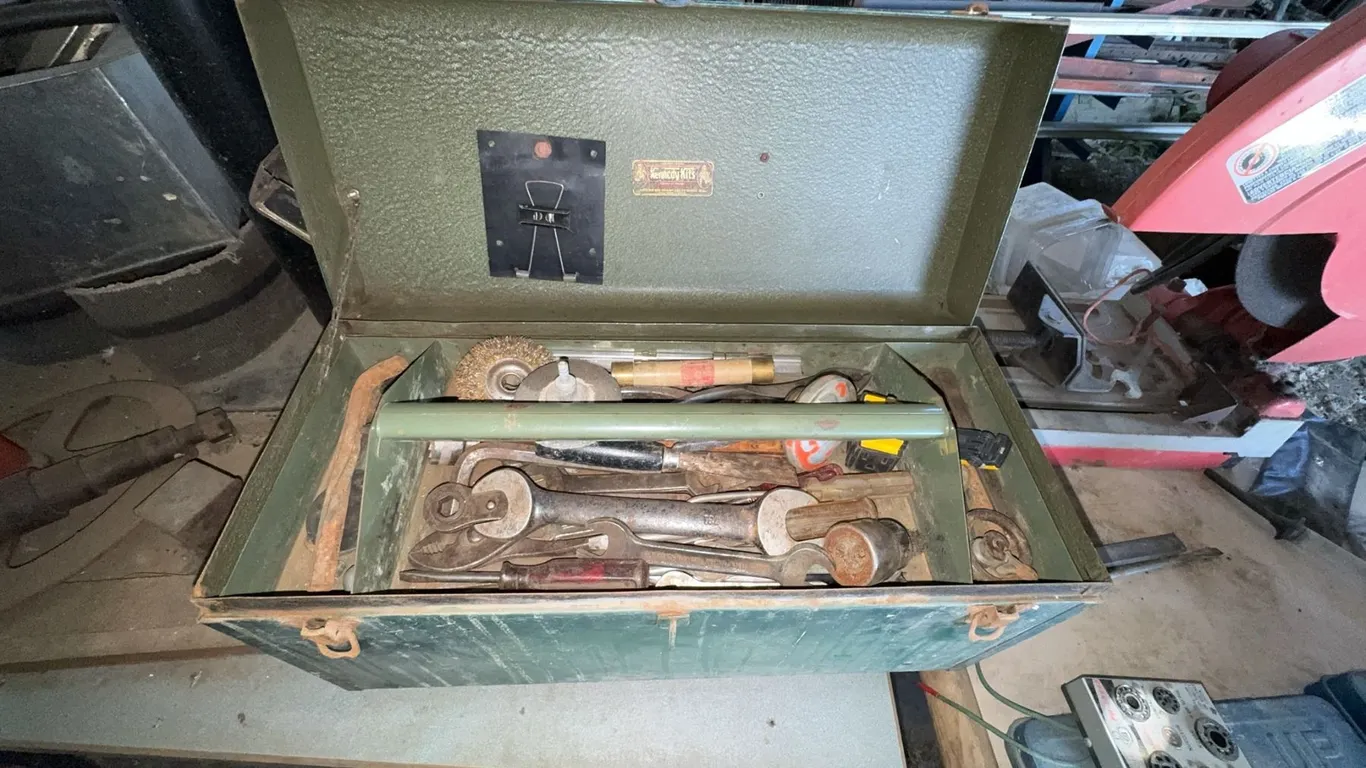 Green Metal Toolbox With Assorted Hand Tools