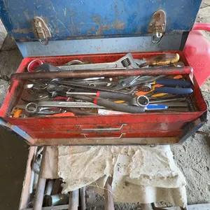 Metal Toolbox With Assorted Hand Tools and Fasteners