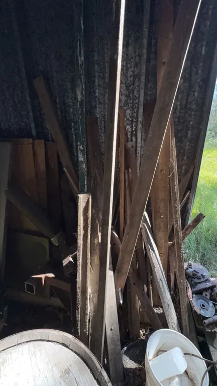 Used Tires, Rims, Scrap Lumber, and Red Tool Cabinet