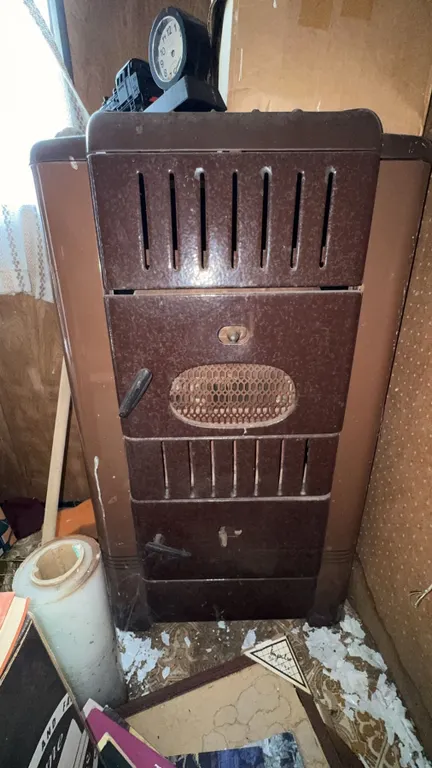 Brown Metal Wood or Coal Burning Heater Stove