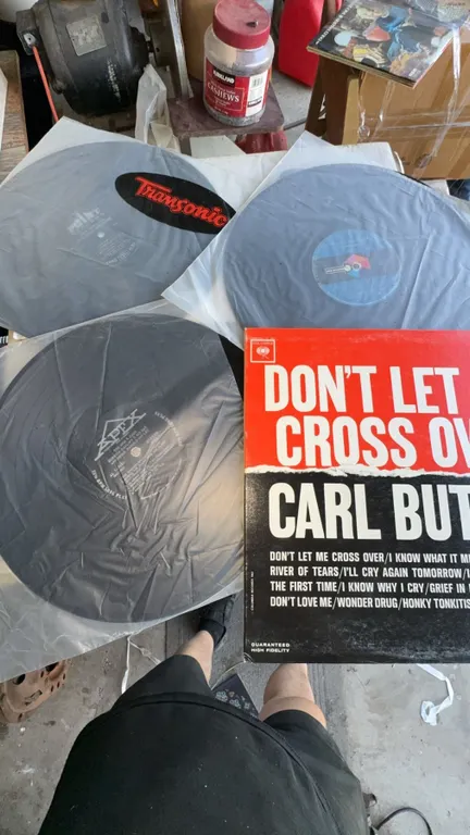 Vinyl Records Including 'Don't Let Me Cross Over' by Carl Butler