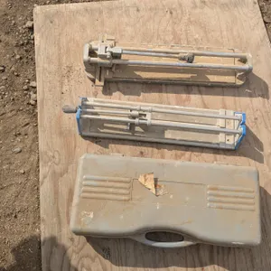 3 tile cutters, one with case