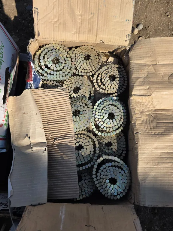 Box full of coiled nails