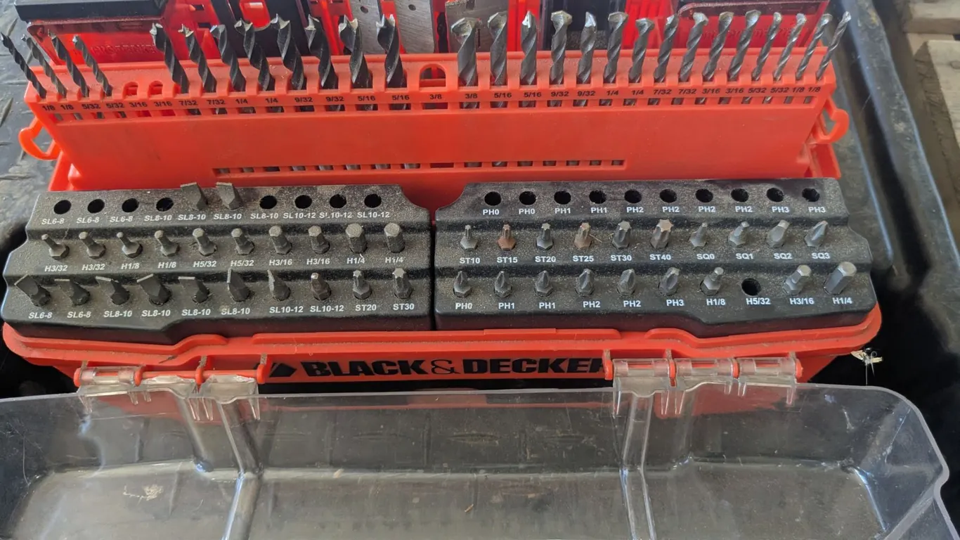 Black and decker screwdriver and drill bits set, in storage case