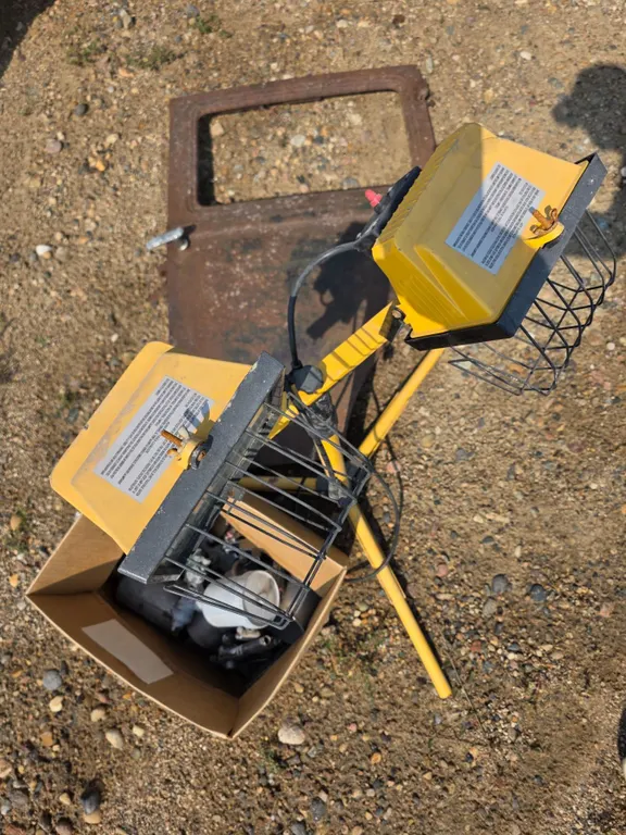 Paint sprayer guns, work light and rusted vehicle door